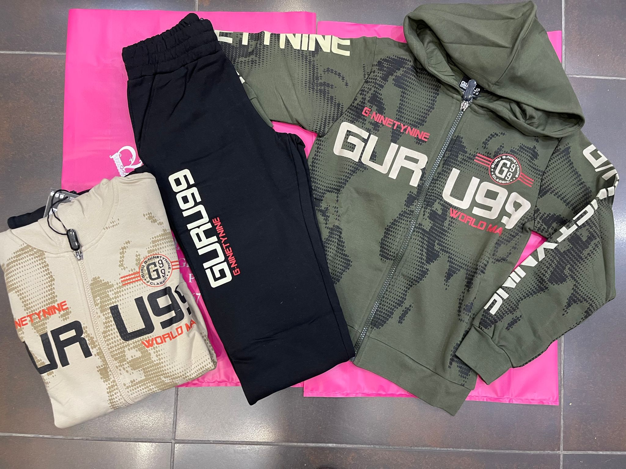 Tuta guru bimbi cappuccio e zip