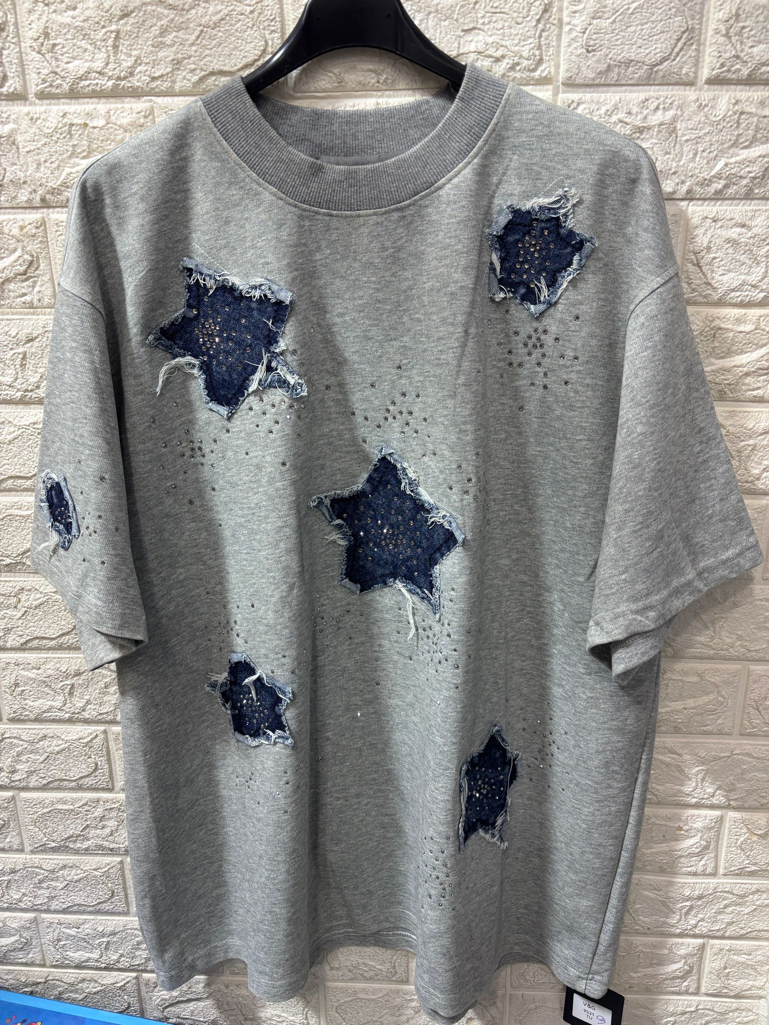 Felpina garzata francese con inserti stelle e strass