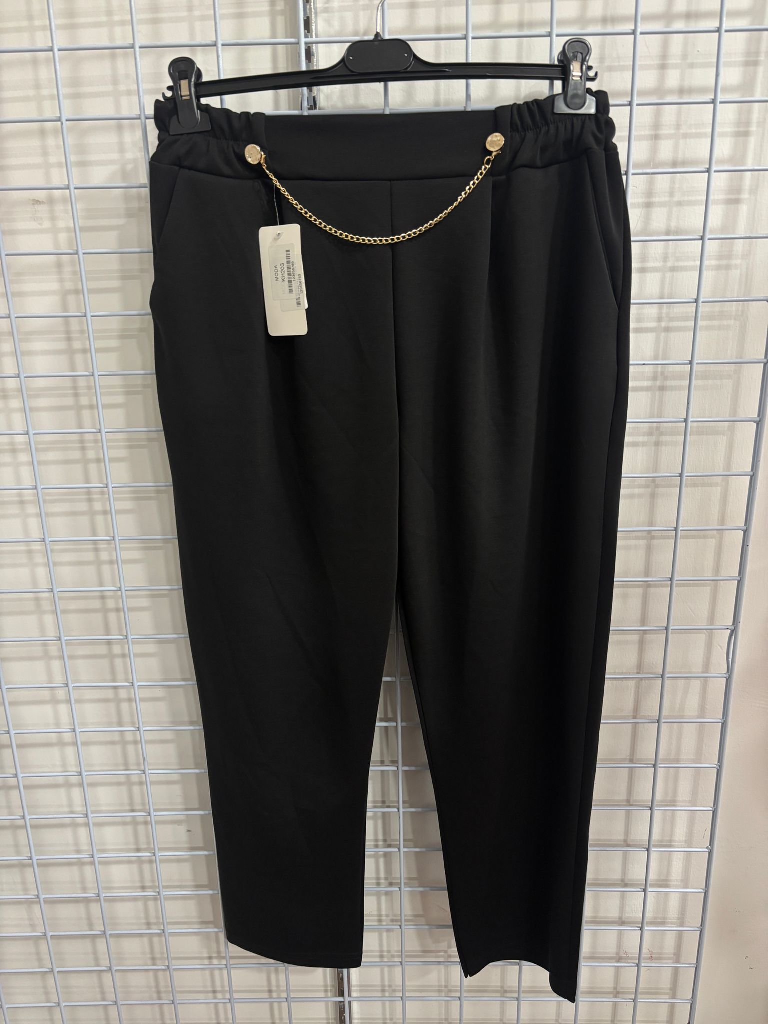 Pantalone con catena