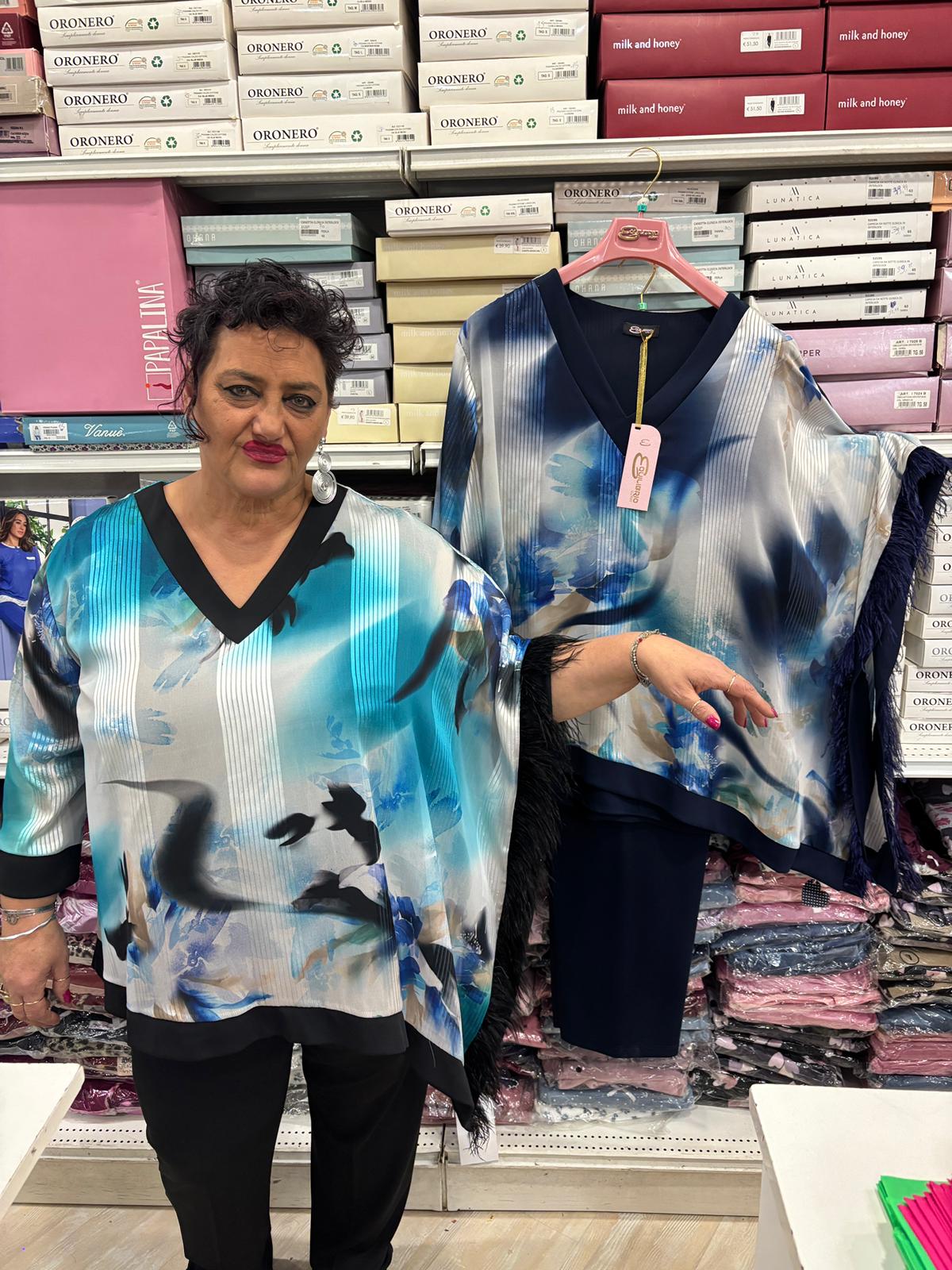 Completo equilibrio in georgette e viscosa piume